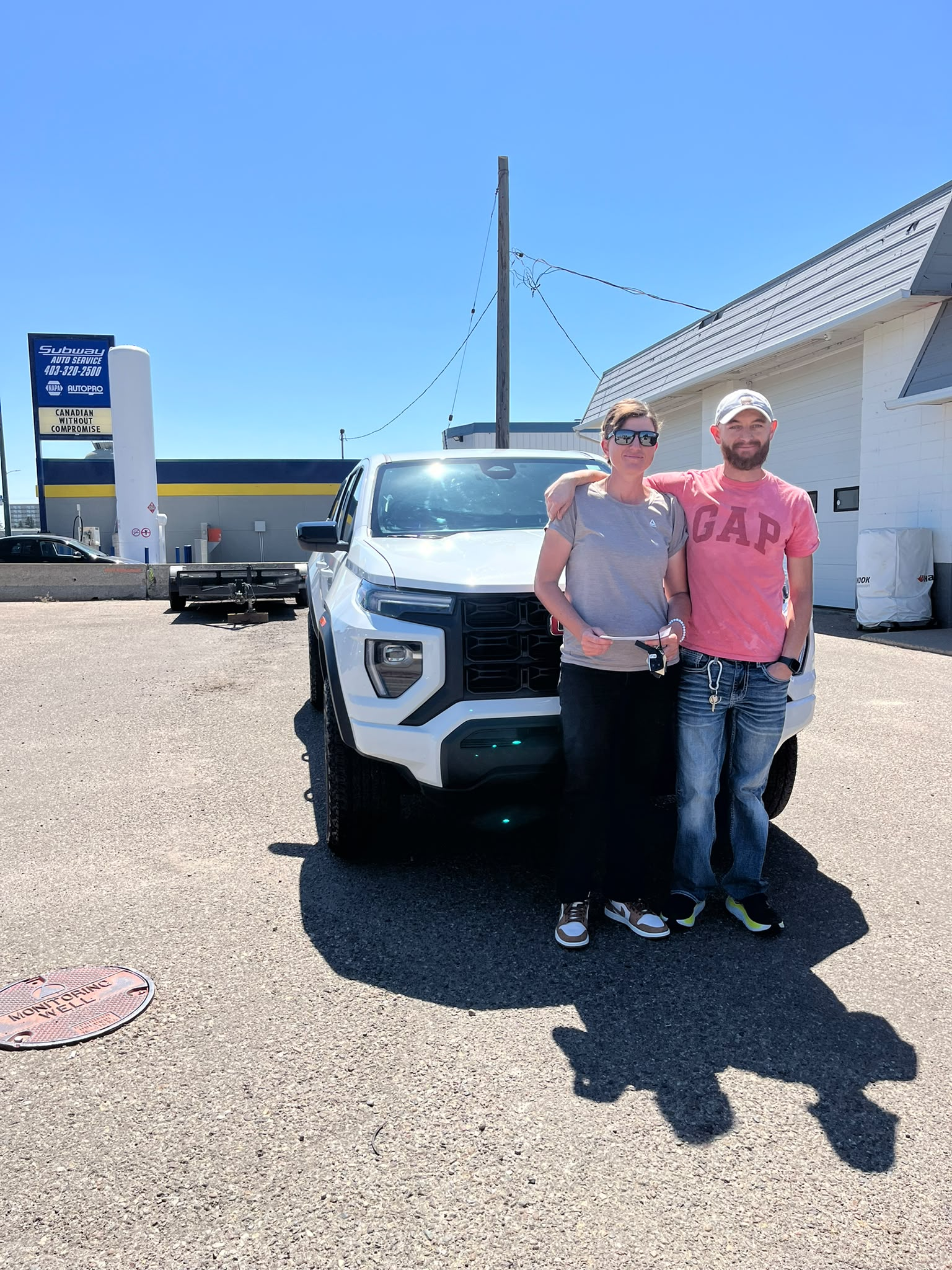 ELM Auto customer with their vehicle